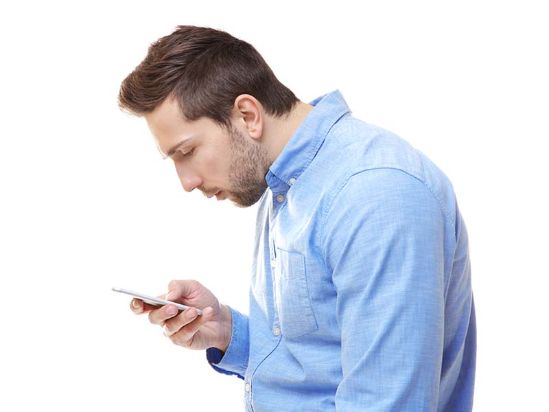 Incorrect posture concept. Man with phone isolated on white